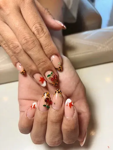 Autumn Cherry Leopard Nail Art in San Marcos, TX